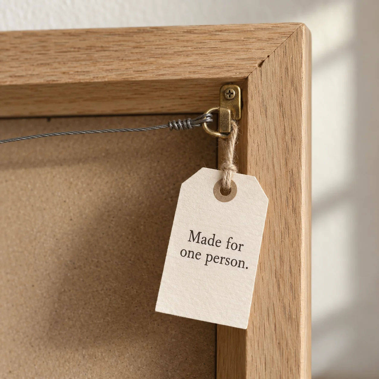 The tag on the back of a finished frame